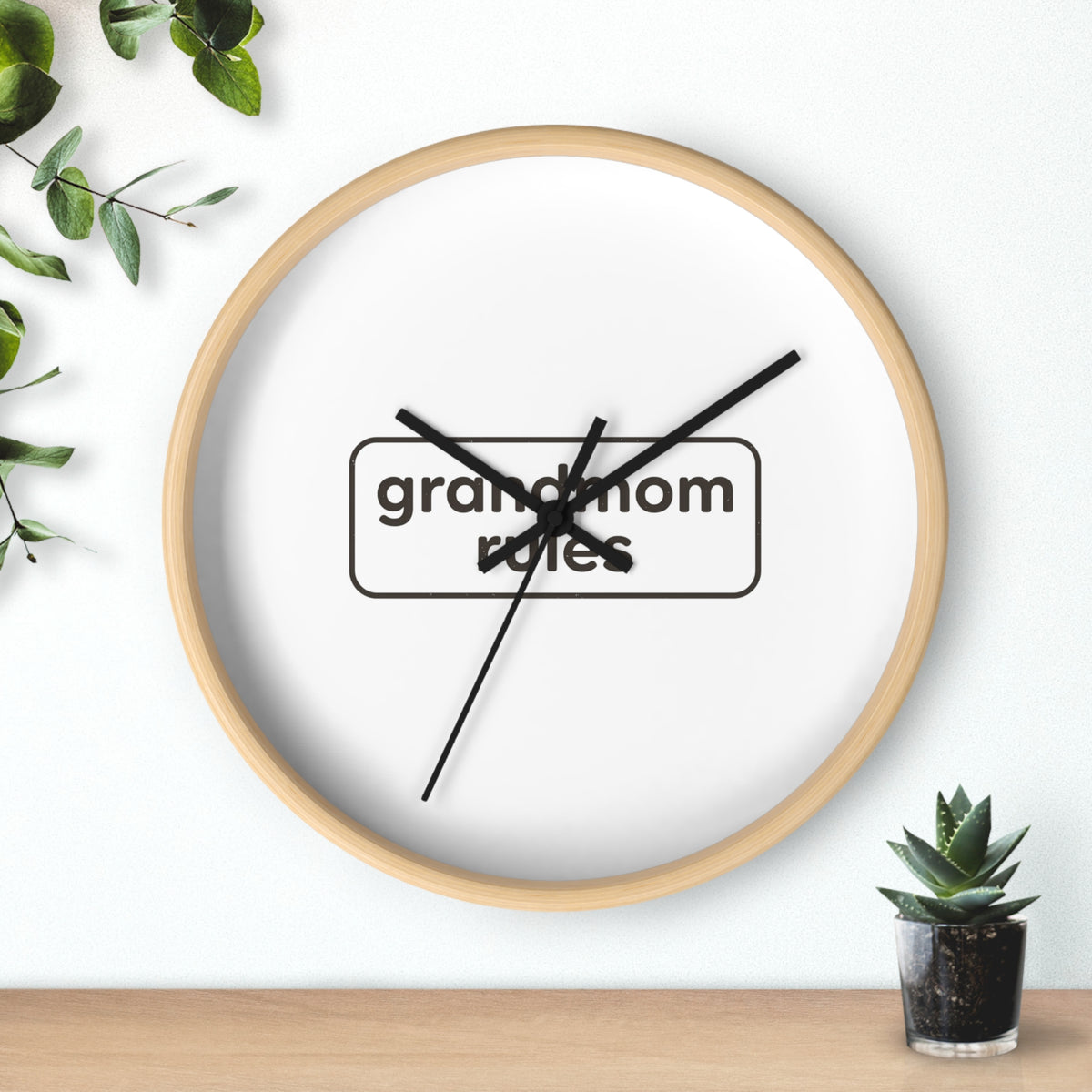 Printify wall clock for home decor, round design with black frame and white face, suitable for living room or office wall.
