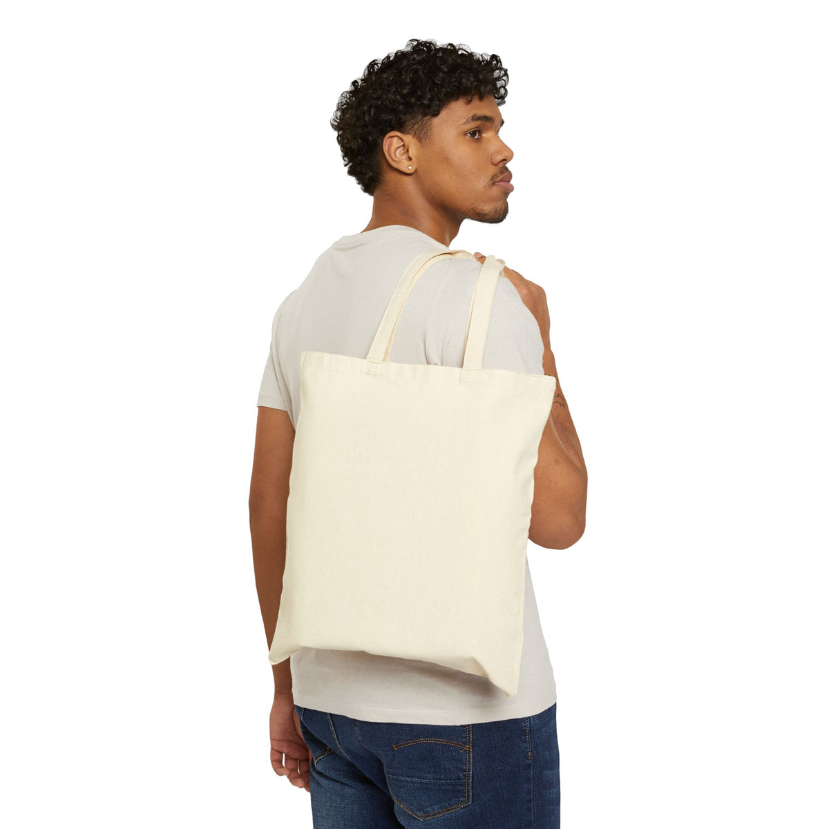 Cotton canvas tote bag by Printify with sturdy handles, natural beige color, and spacious design for everyday carrying.