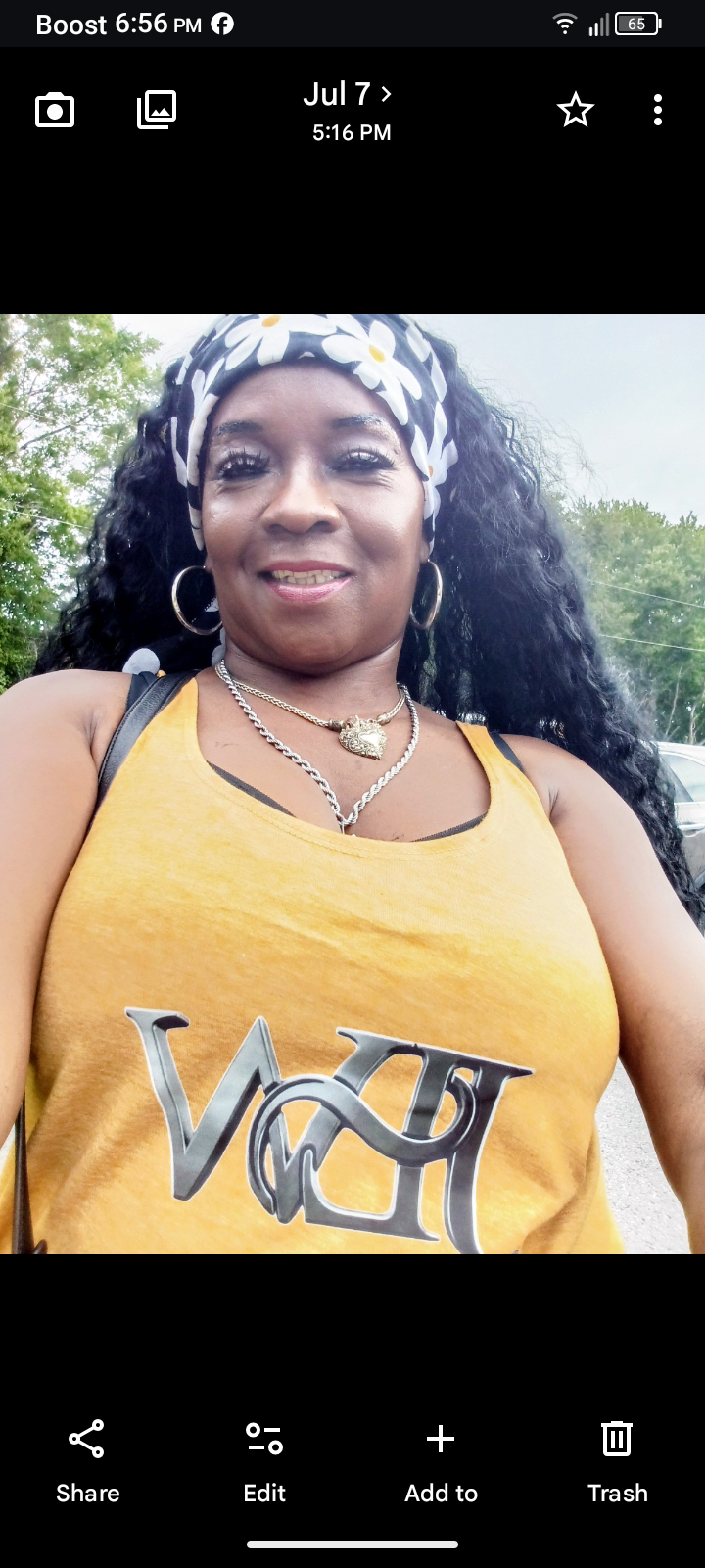 Women's Festival Tank T-Shirt by Printify featuring vibrant, colorful festival-themed graphics on a comfortable tank top.
